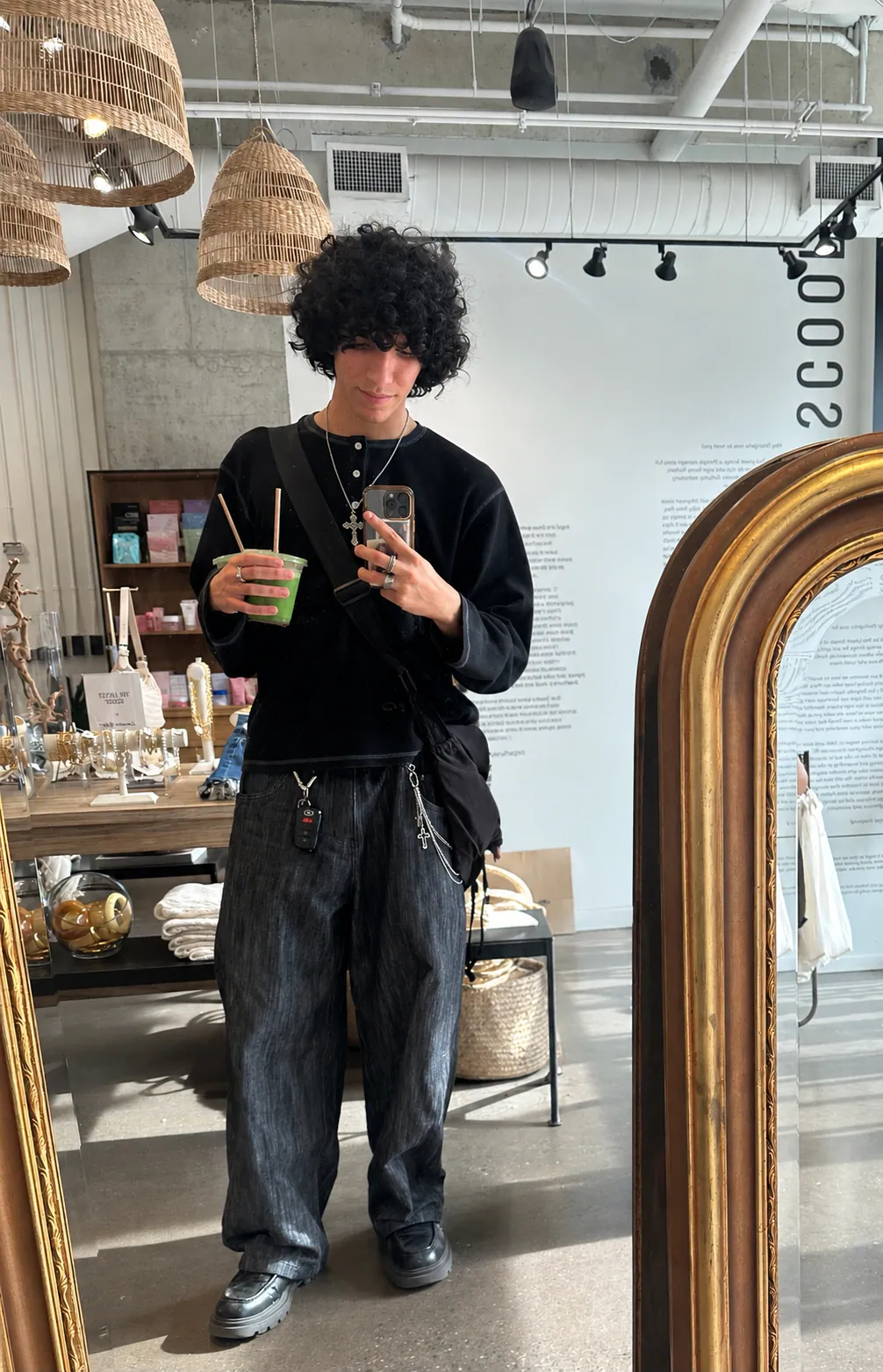 Fit B: black layered outfit with wide-leg jeans
